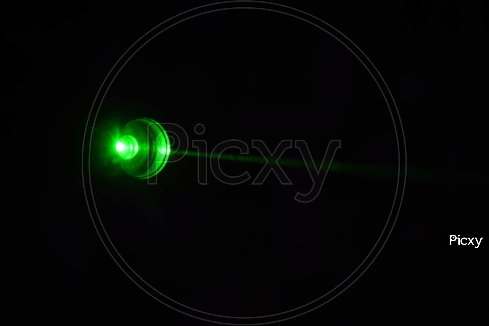 disco green light on black background