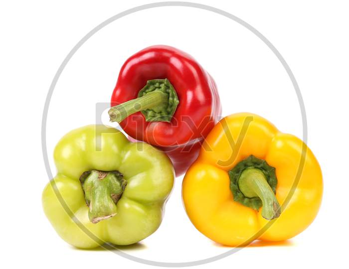 Three Colored Peppers. Isolated On A White Background.