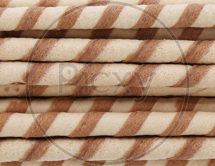 Waffle Roll With Chocolate Cream. Whole Background.
