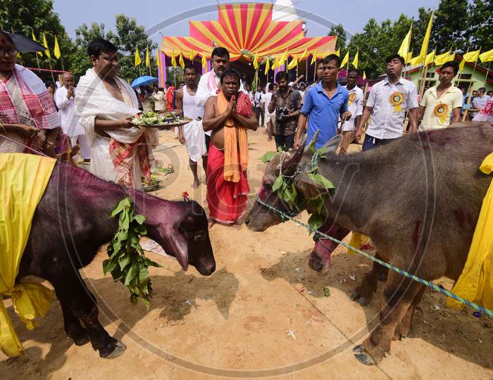 People burning a Meji which is made of bamboo and straw during Bhogali Bihu celebrations in Nagaon district