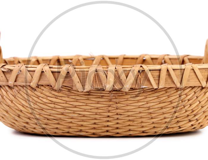 Close Up Of Wicker Basket. Isolated On A White Background.