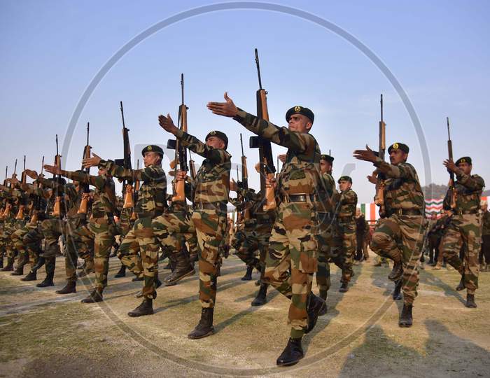 Paramilitary force personnel take part in a full dress rehearsal ahead of events to mark India's Republic Day in Guwahati
