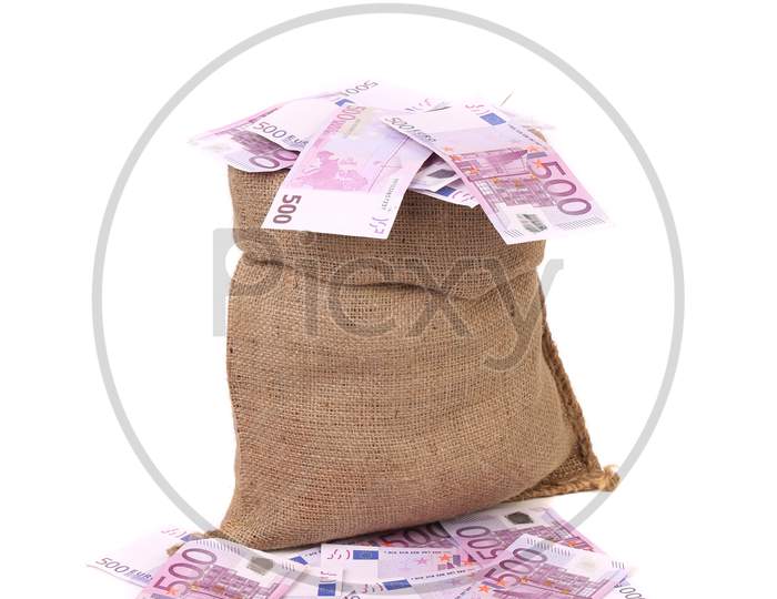 Bag With Many Euro Banknotes. Isolated On A White Background.