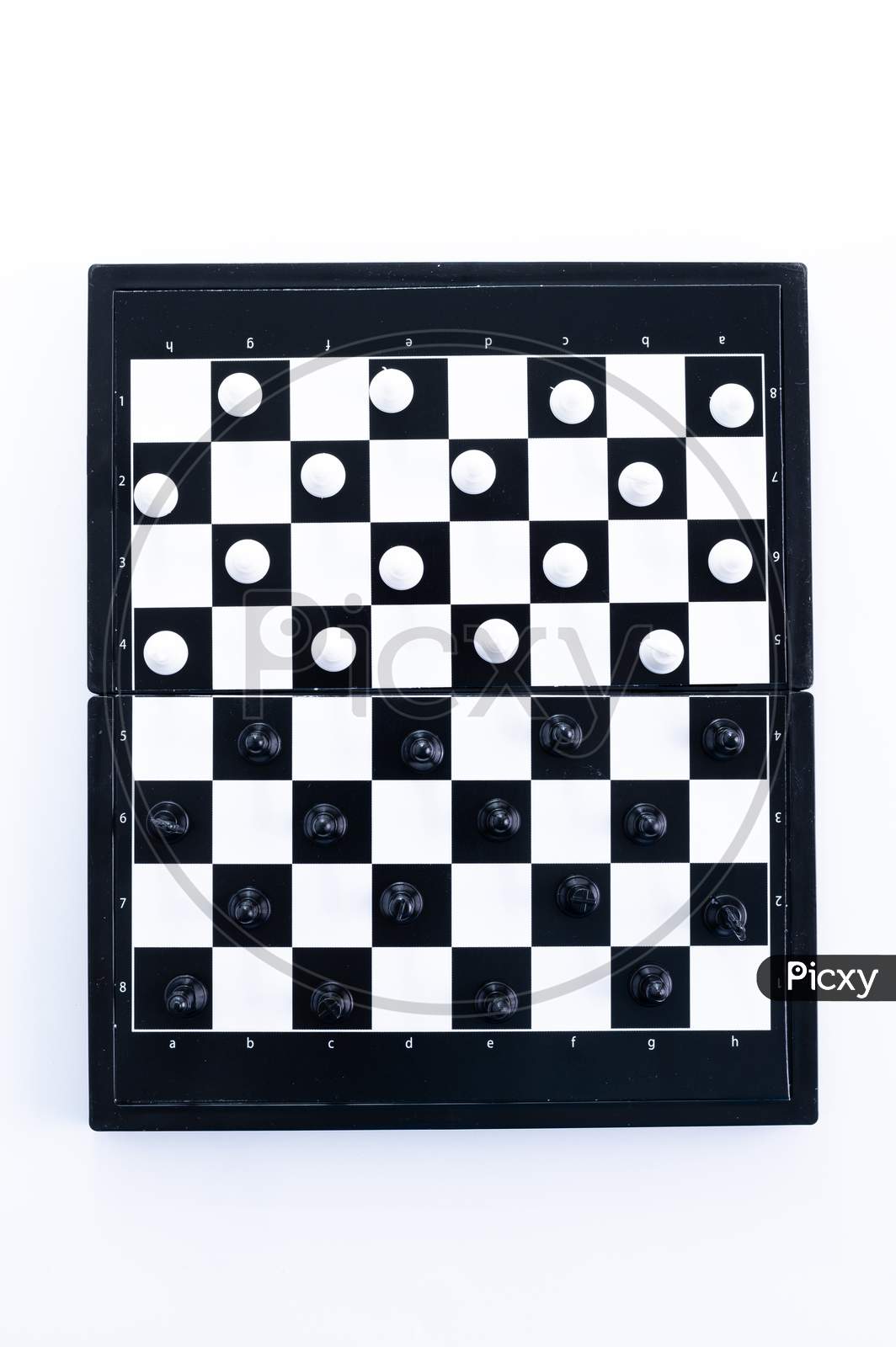 Symbol Of Competition. Chess Board And Chess Figures On White Background Top View Copy Space