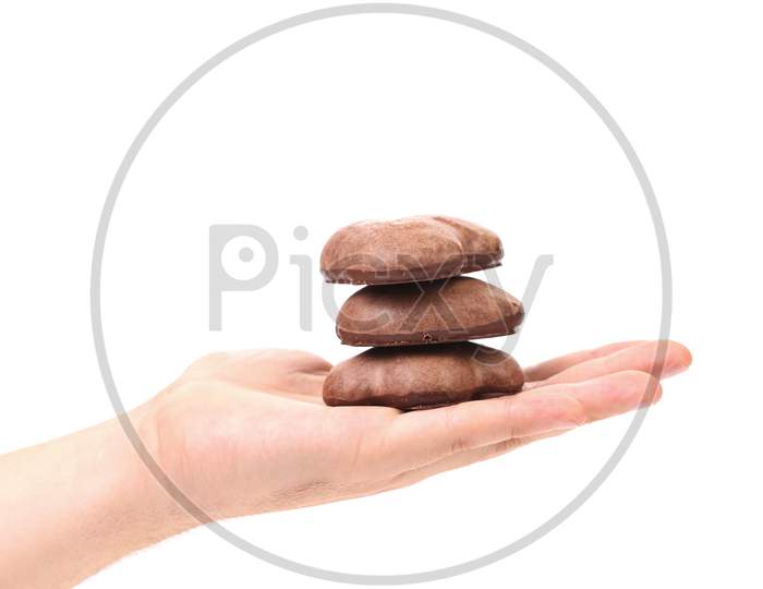 Hand Hold Kisses Cookies With Chocolate. Isolated On A White Background.