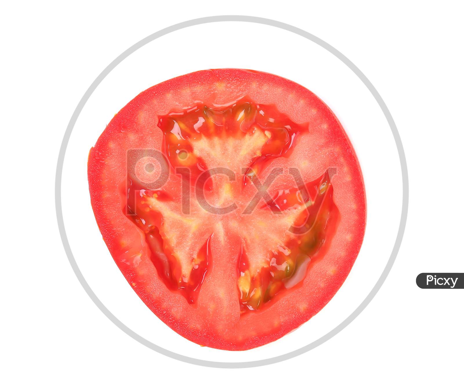 Close Up Of Red Tomato Half. Isolated On A White Background.