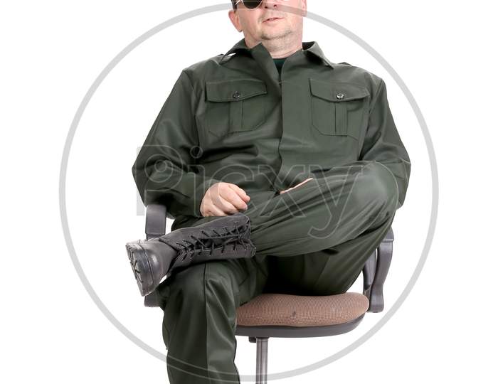 Worker In Glasses Sitting On Chair. Isolated On A White Background.