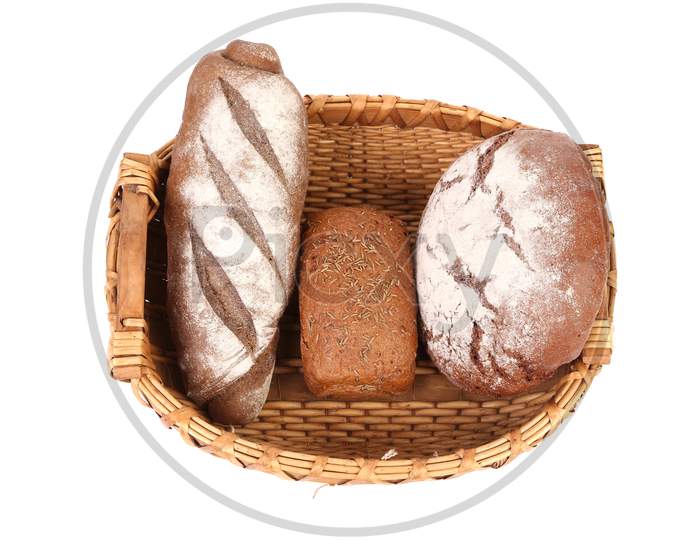 Fresh Bread In Baskets Isolated On White Background
