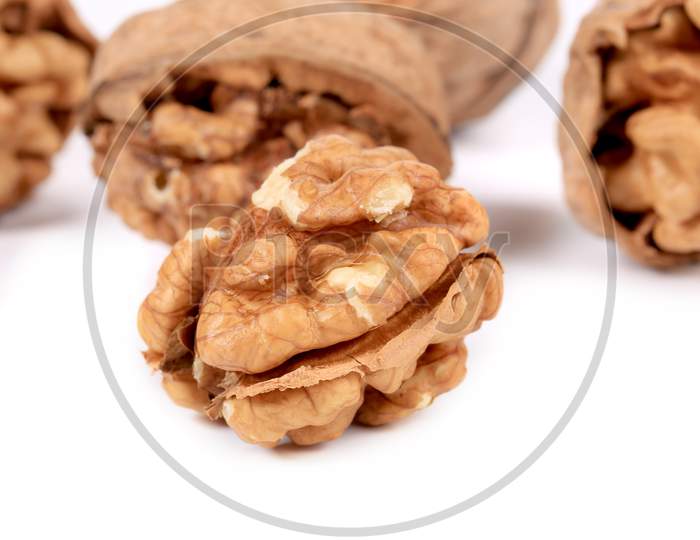 Bunch Of Walnuts Whole And Cracked. Whole Background.
