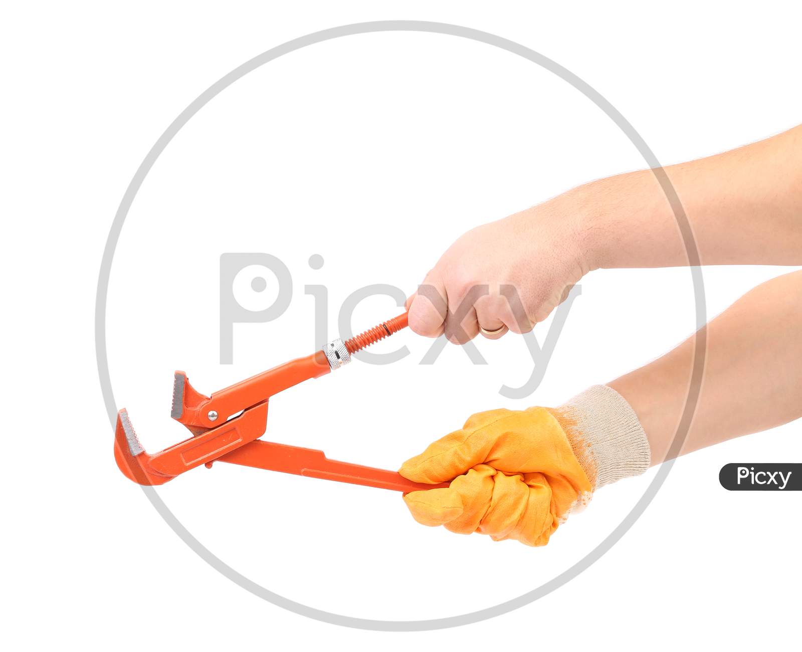 Wiew Of Hands Opening A Wrench. Isolated On A White Background.