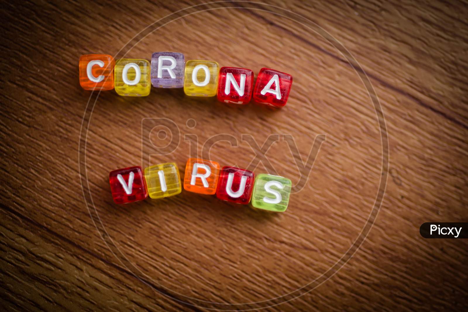 Colorful Word Corona Virus English Alphabet Cube On Brown Color Background , Selective Focus