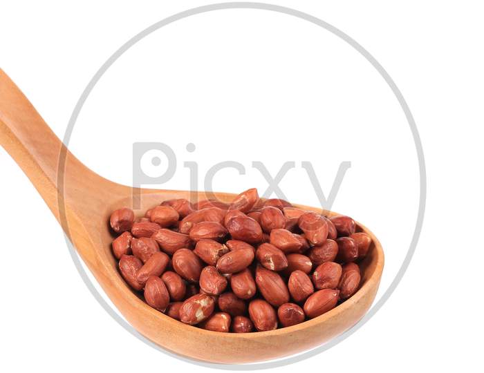 Wooden Spoon With Peanuts. Isolated On A White Background.