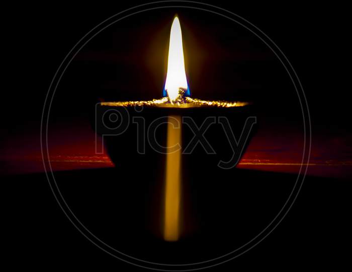 Indian oil lamp light against corona virus  . stock photo