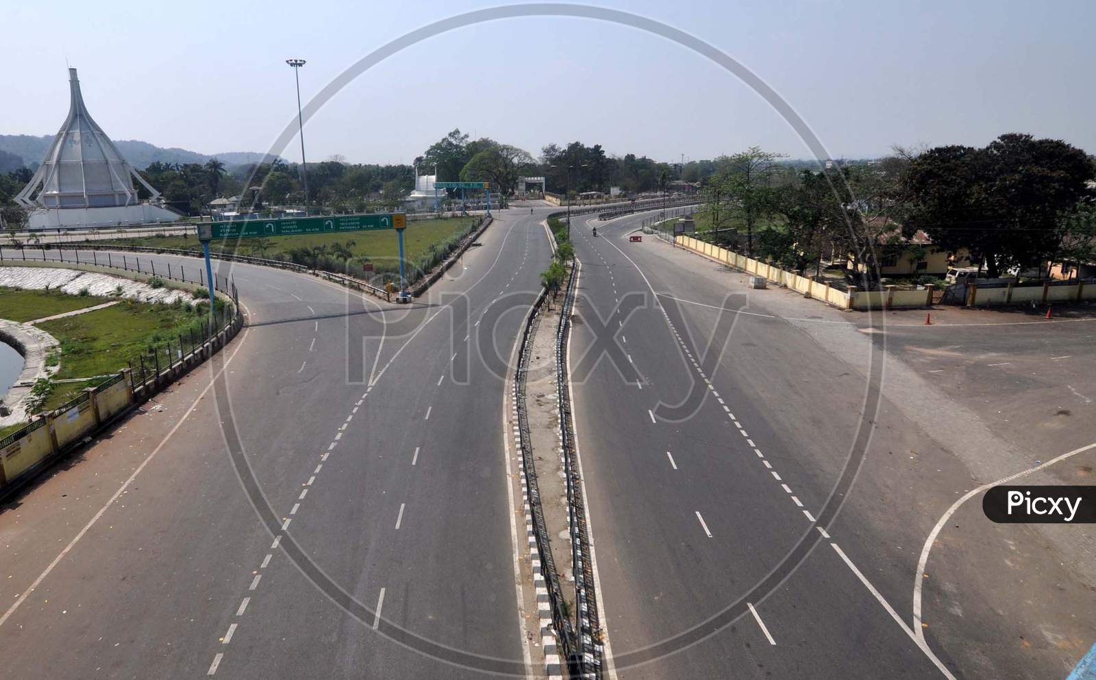 A Deserted Road On The First Day Of 21-Day Complete Lockdown In The Wake Of The Corona Virus Pandemic In Guwahati On Wednesday, 25 March 2020.