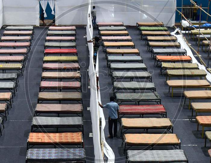 Workers  Arranges Beds To Prepare A Quarantine Centre In An Indoor Stadium At The Sarusajai Sports Complex During A Government-Imposed Nationwide Lockdown As A Preventive Measure Against The Covid-19 Coronavirus In Guwahati,India