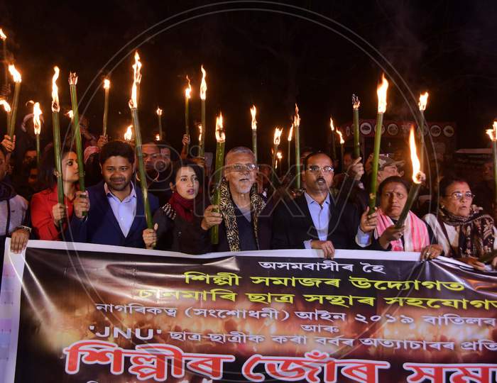 Activists of All Assam Students Union (AASU) along with 30 Ethnic Organisation taking out a torch light rally protest against Citizenship Amendment Act (CAA) in Guwahati