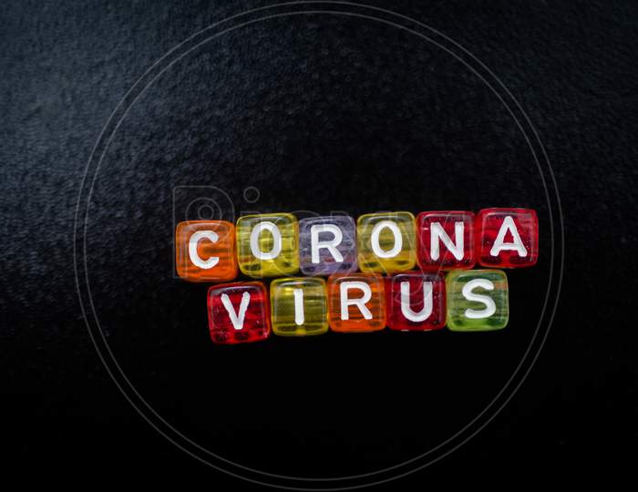 Colorful Word Corona Virus English Alphabet Cube On Black Color Background , Selective Focus