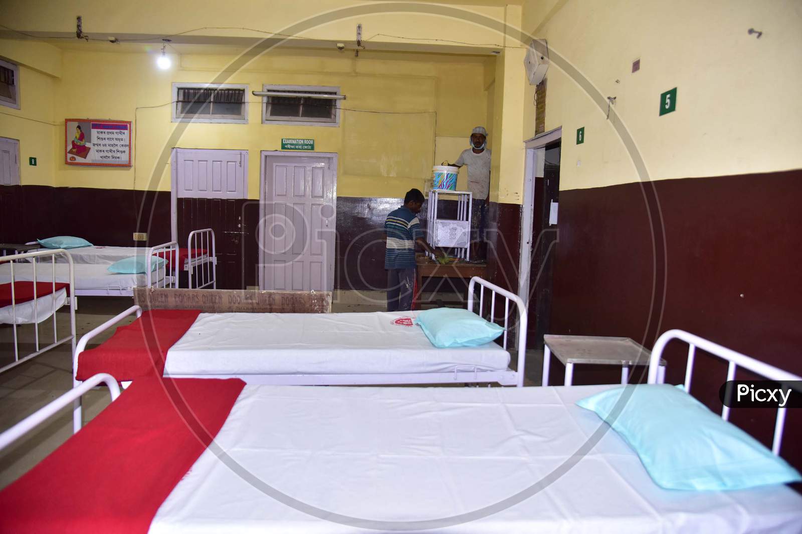 Workers Work On A Construction Of A Isolation Ward  At Civil Hospital  During A Government-Imposed Nationwide Lockdown As A Preventive Measure Against The Covid-19 Coronavirus In Nagaon District Of Assam On March 30,2020
