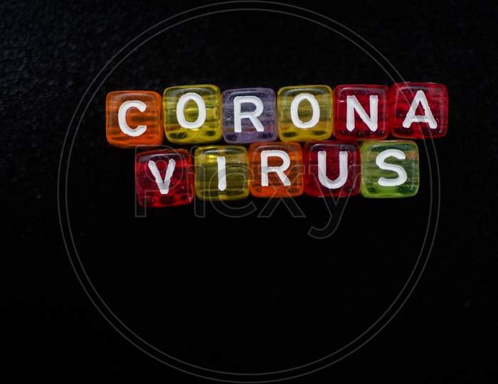 Colorful Word Corona Virus English Alphabet Cube On Black Color Background , Selective Focus