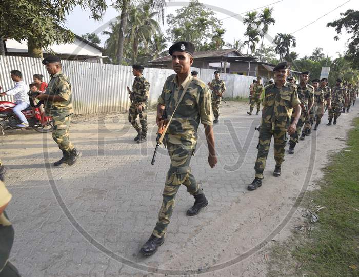 Indian  Security Personnel Patrol On A Road Ahead Of The Publication Of The Final Draft Of The National Register Of Citizens (Nrc) At  Rupohi Village In Nagaon District, Northeastern State Of Assam, India August 30, 2019.