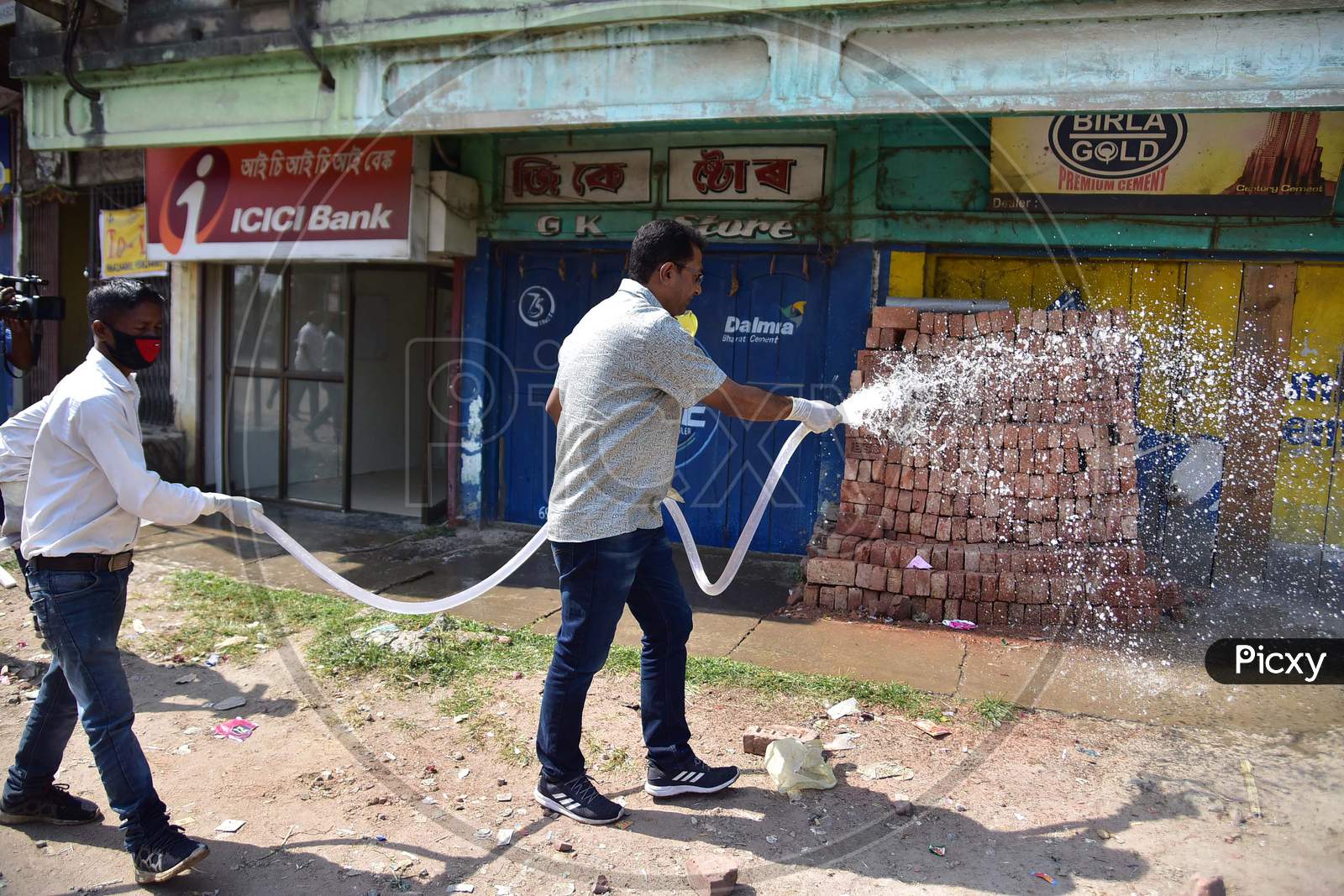 Nagaon  Nagaon Mla Rupak Sarmah Sprays Disinfectant On A Street To Contain The Spread Of Coronavirus During The Nationwide Lockdown In Nagaon District Of Assam On April 03,2020.