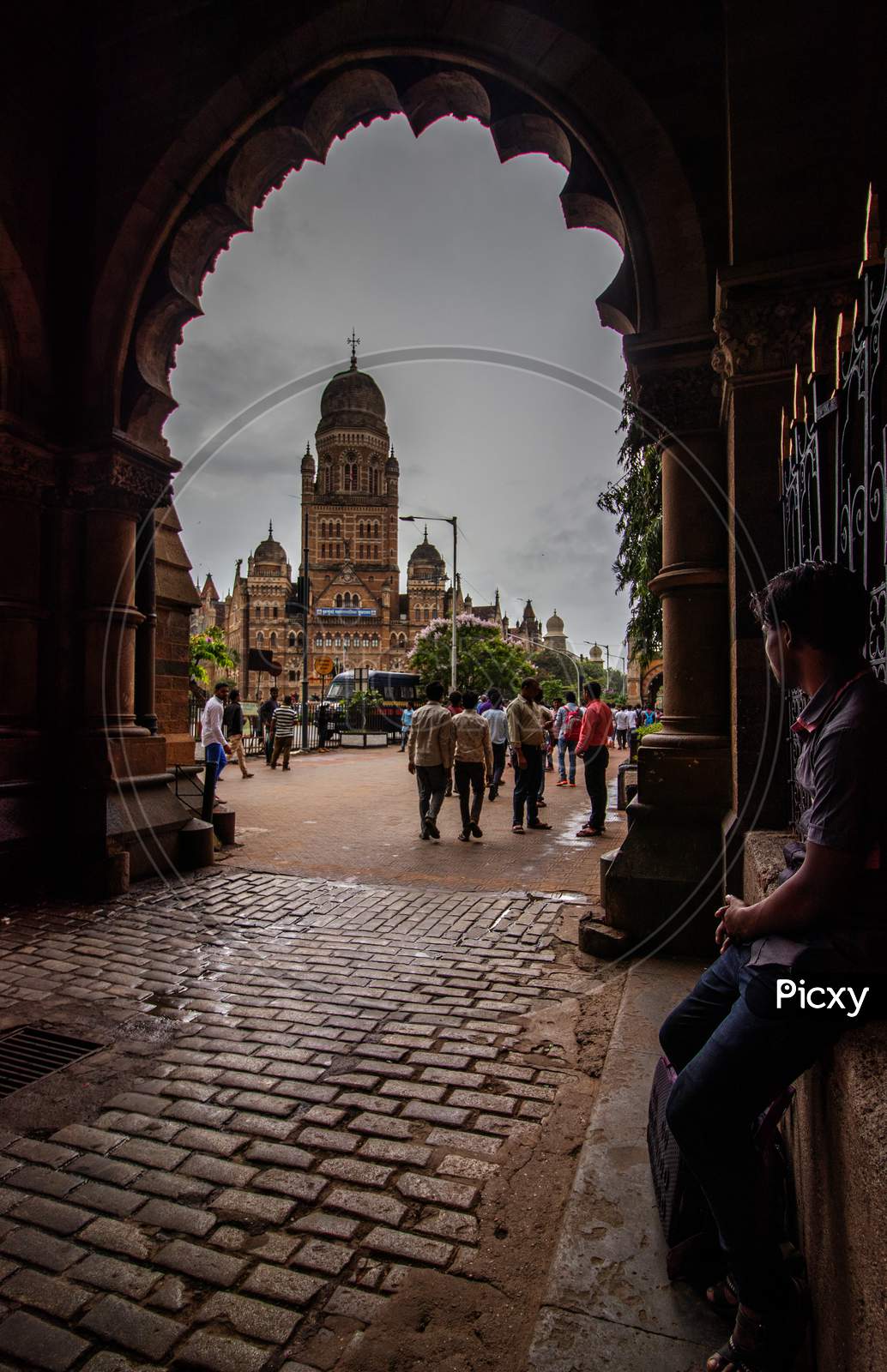 A Person Looking At The BMC Building Bombay
