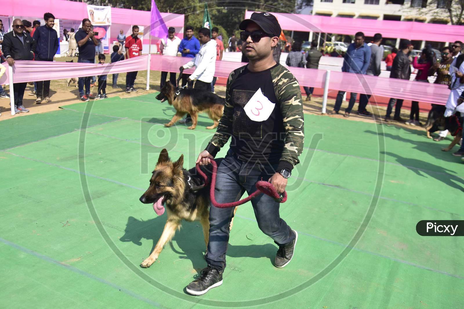 Dog Lovers With Their Dogs At Dog  show in Guwahati