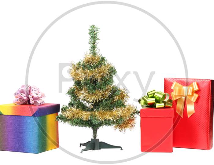 Christmas Tree With Two Gift Boxes. Isolated On A White Background.