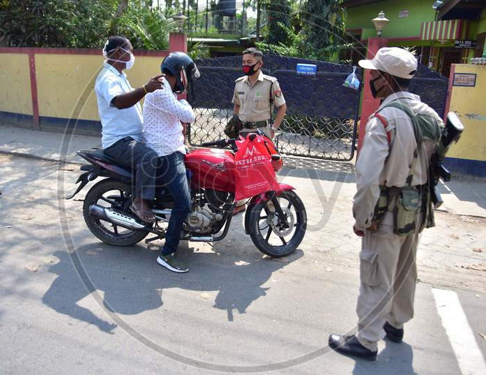 Police Personnel Question Commuters Who Defied Curfew During A 21-Day Nationwide Lockdown, In The Wake Of Coronavirus Pandemic, In Nagaon District Of Assam ,India