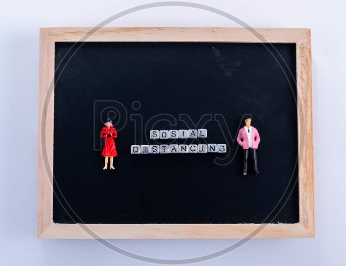 Pandemic Corona Virus Conceptual Miniature People Photography – Social Distancing Strategy