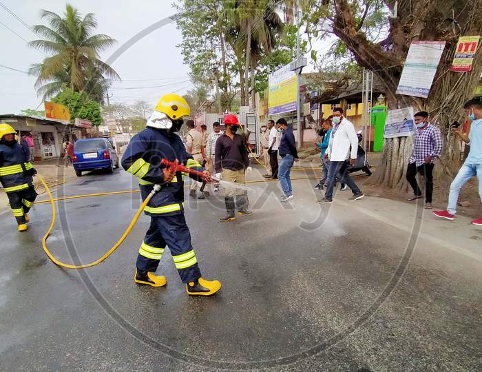 Firefighter Sprays Disinfectants As A Preventive Measure Against The Spread Of The New Coronavirus On A Street  At Hajo In Kamrup District Of Assam ,India