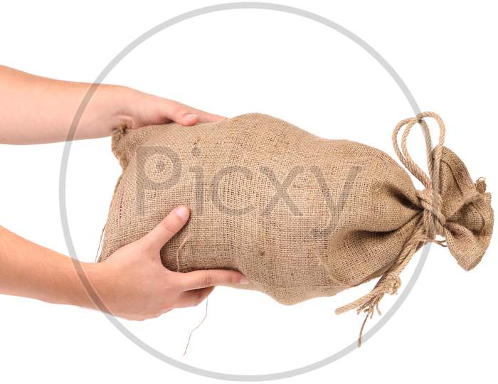 Hands Hold Full Bag With Money.  Isolated On A White Background.