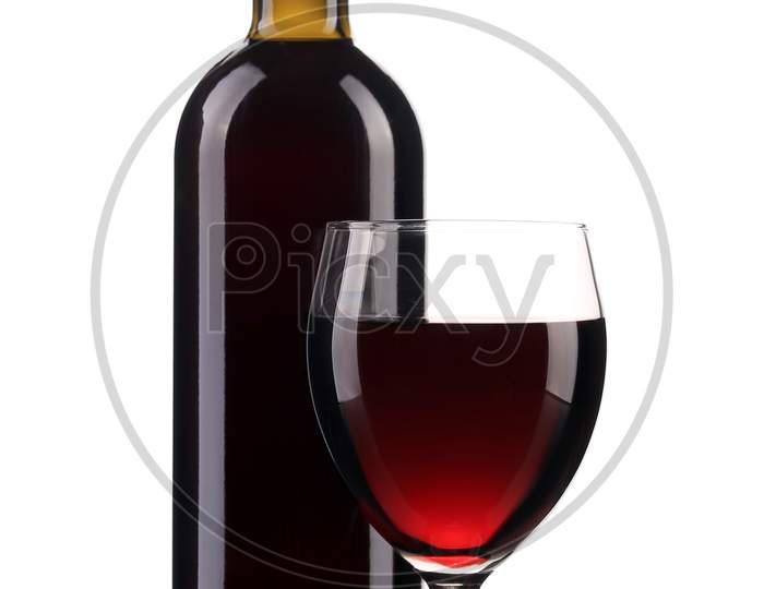 Close Up Of Glass And Wine Bottle. Isolated On A White Background.