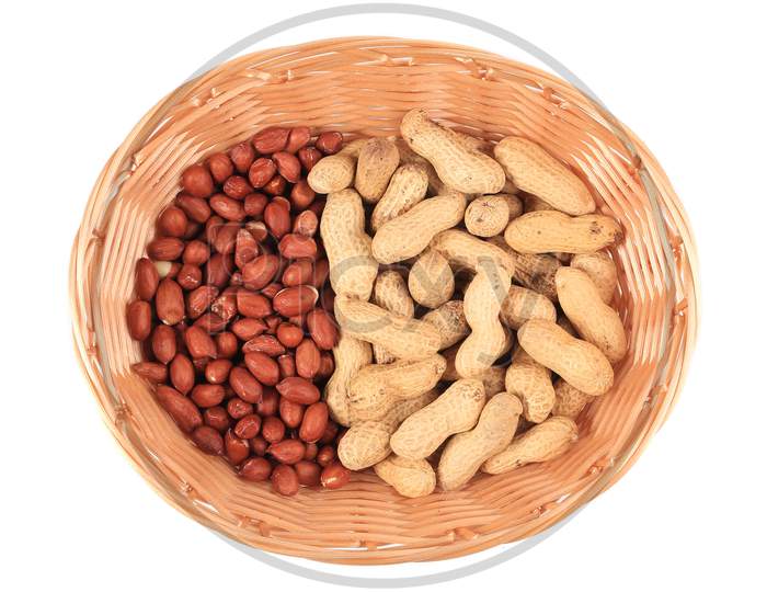 Basket Full With Peanuts. Isolated On A White Background.