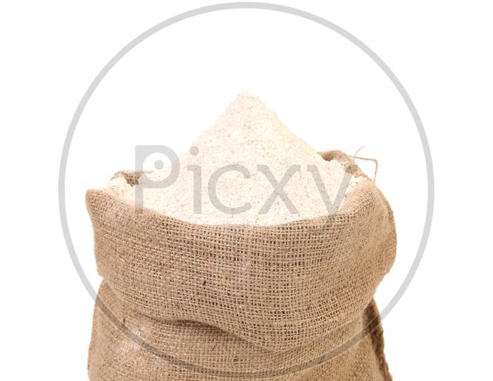 Sack With Wheat Flour. Isolated On A White Background.