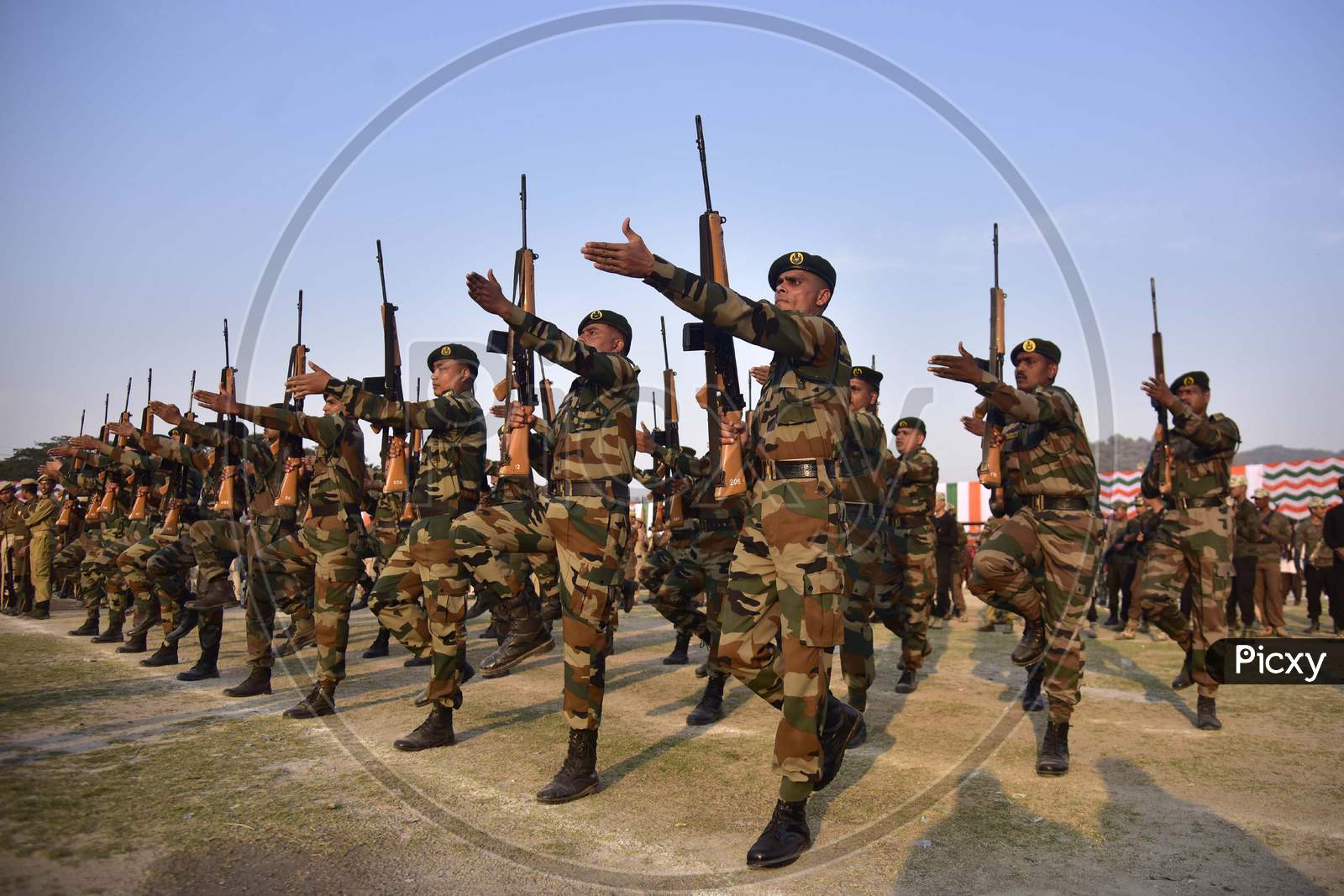 Paramilitary force personnel take part in a full dress rehearsal ahead of events to mark India's Republic Day in Guwahati