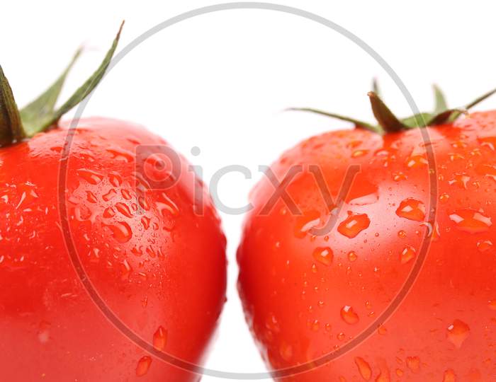 Two Red Ripe Tomatoes Close Up. Whole Background.