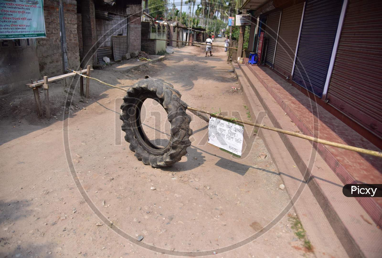 A  Barricade Made Of Bamboo Laid Across A Road By Residents During A 21-Day Nationwide Lockdown To Limit The Spreading Of Coronavirus Disease (Covid-19) At Dimoruguri In Nagaon District Of Assam On March 28,2020.