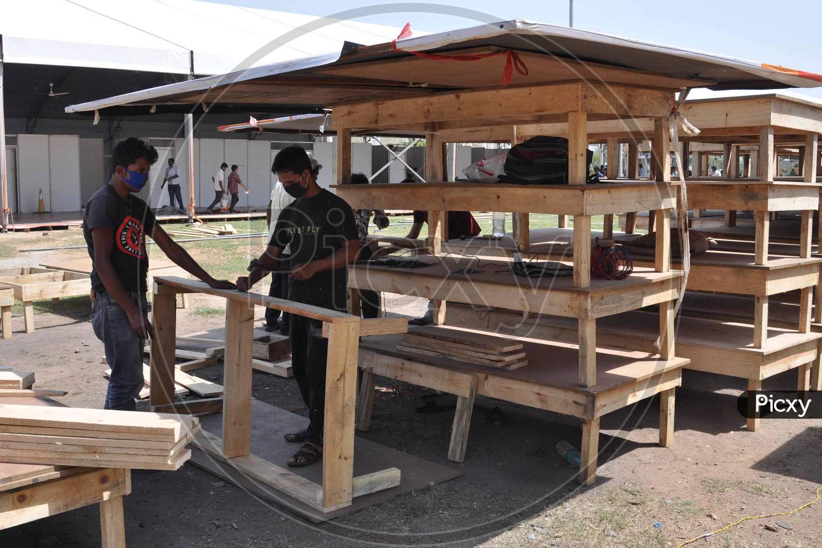Workers Work On A Construction Of A Quarantine Center  At The Sarusajai Sports Complex During A Government-Imposed Nationwide Lockdown As A Preventive Measure Against The Covid-19 Coronavirus In Guwahati,India
