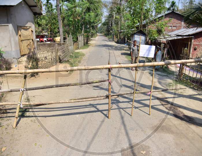 A Bamboo Laid Across A Road By Residents During A 21-Day Nationwide Lockdown To Limit The Spreading Of Coronavirus Disease (Covid-19) At A Village In Nagaon District Of Assam,India