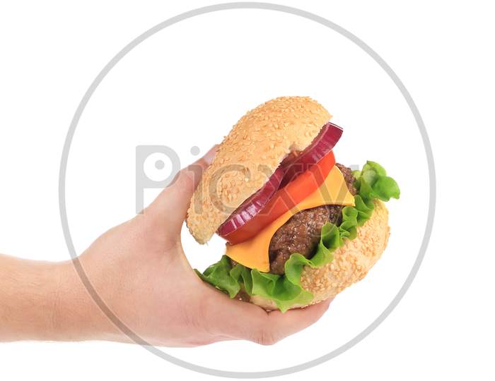 Big Tasty Hamburger In Hand. Isolated On A White Background.