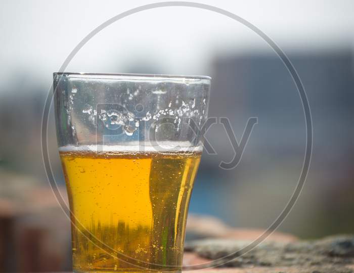 glass of beer on wall