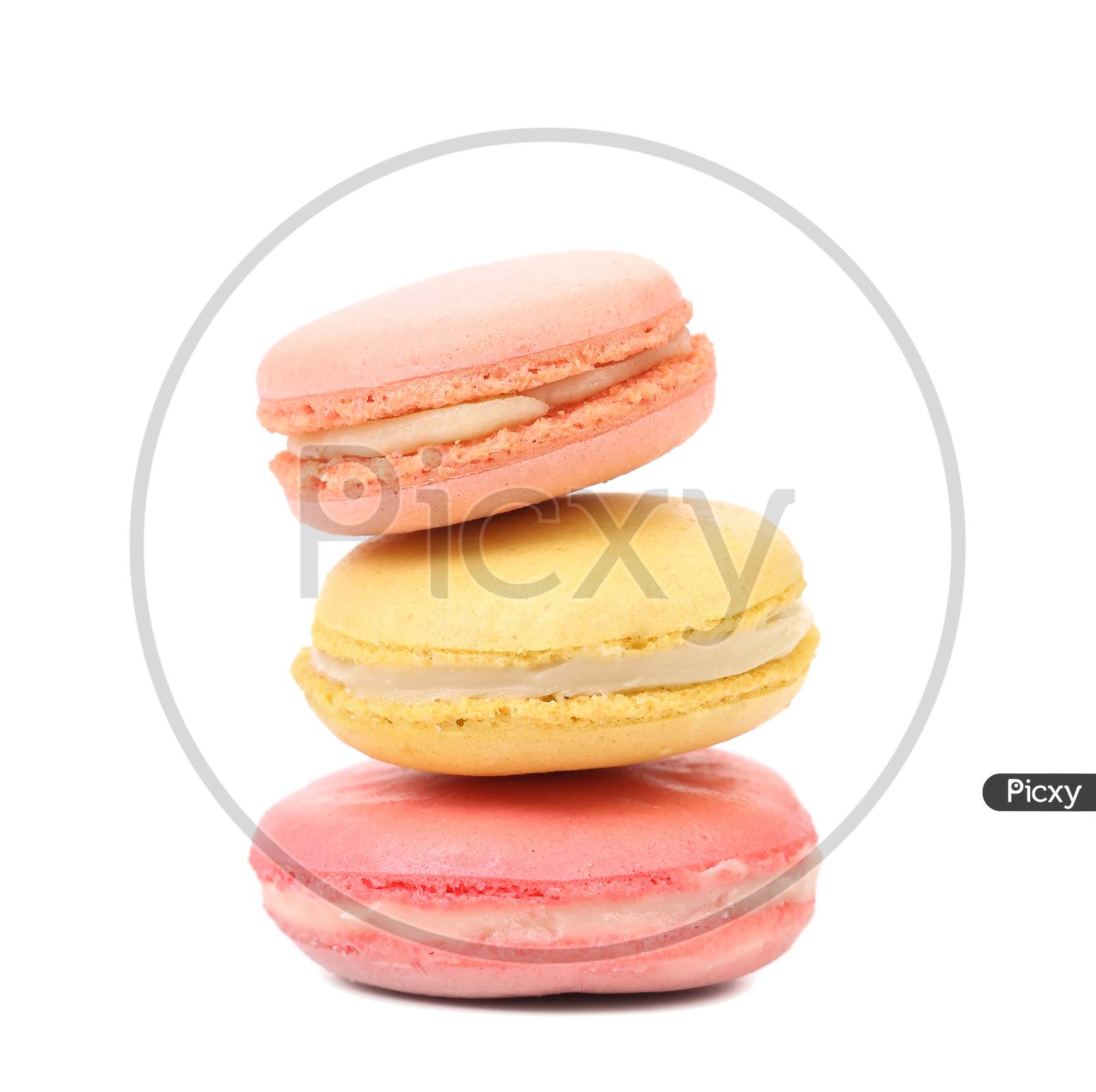 Stack Of Various Macarons. Isolated On A White Background.
