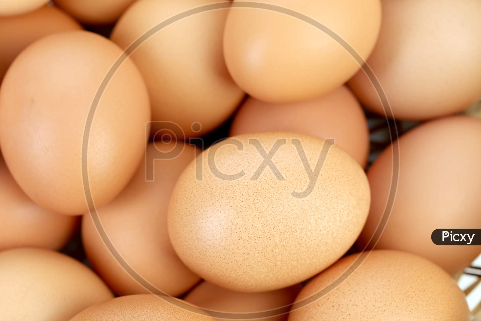 Bunch Of Brown Eggs. Close Up. Whole Background.