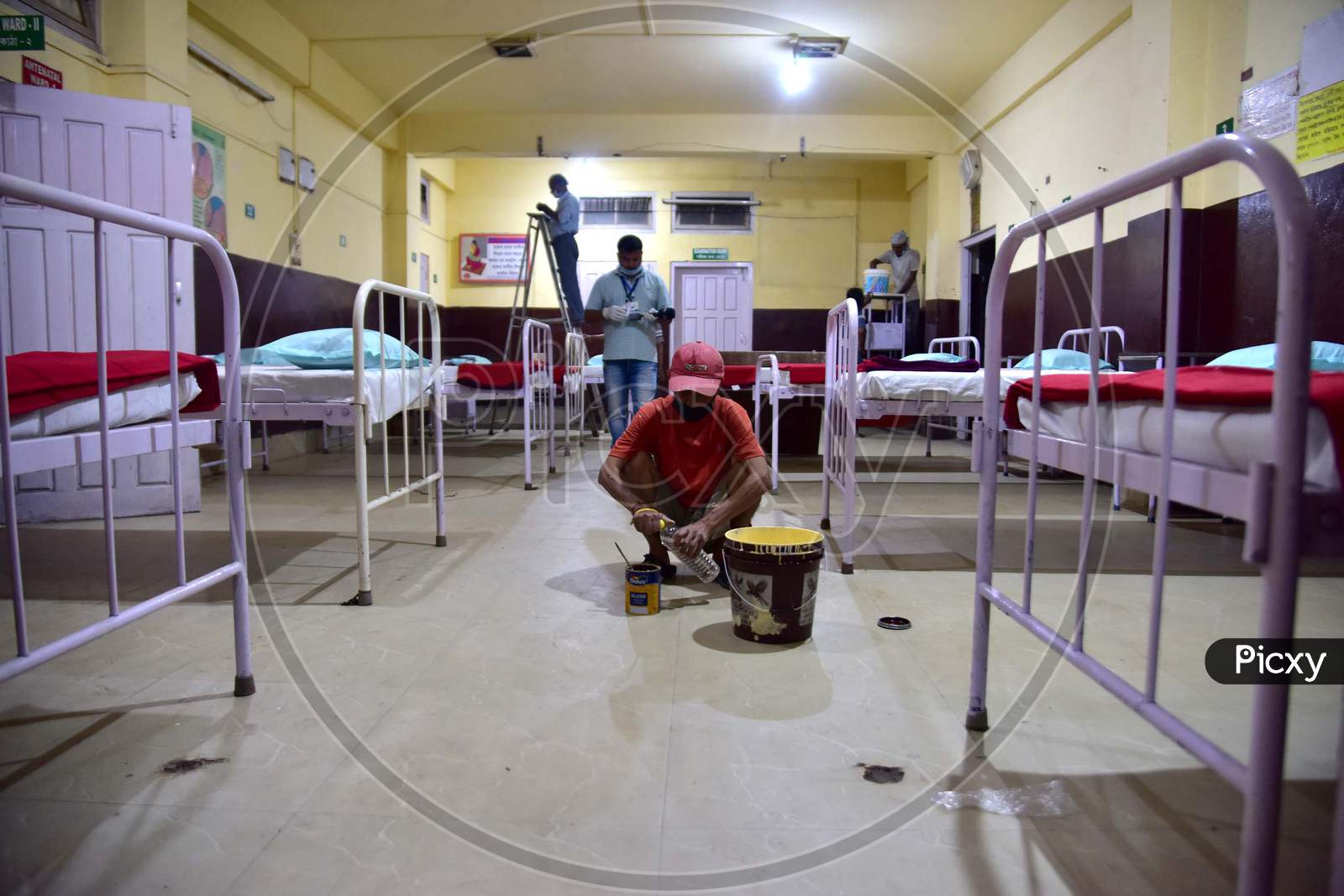 Workers Work On A Construction Of A Isolation Ward  At Civil Hospital  During A Government-Imposed Nationwide Lockdown As A Preventive Measure Against The Covid-19 Coronavirus In Nagaon District Of Assam On March 30,2020.