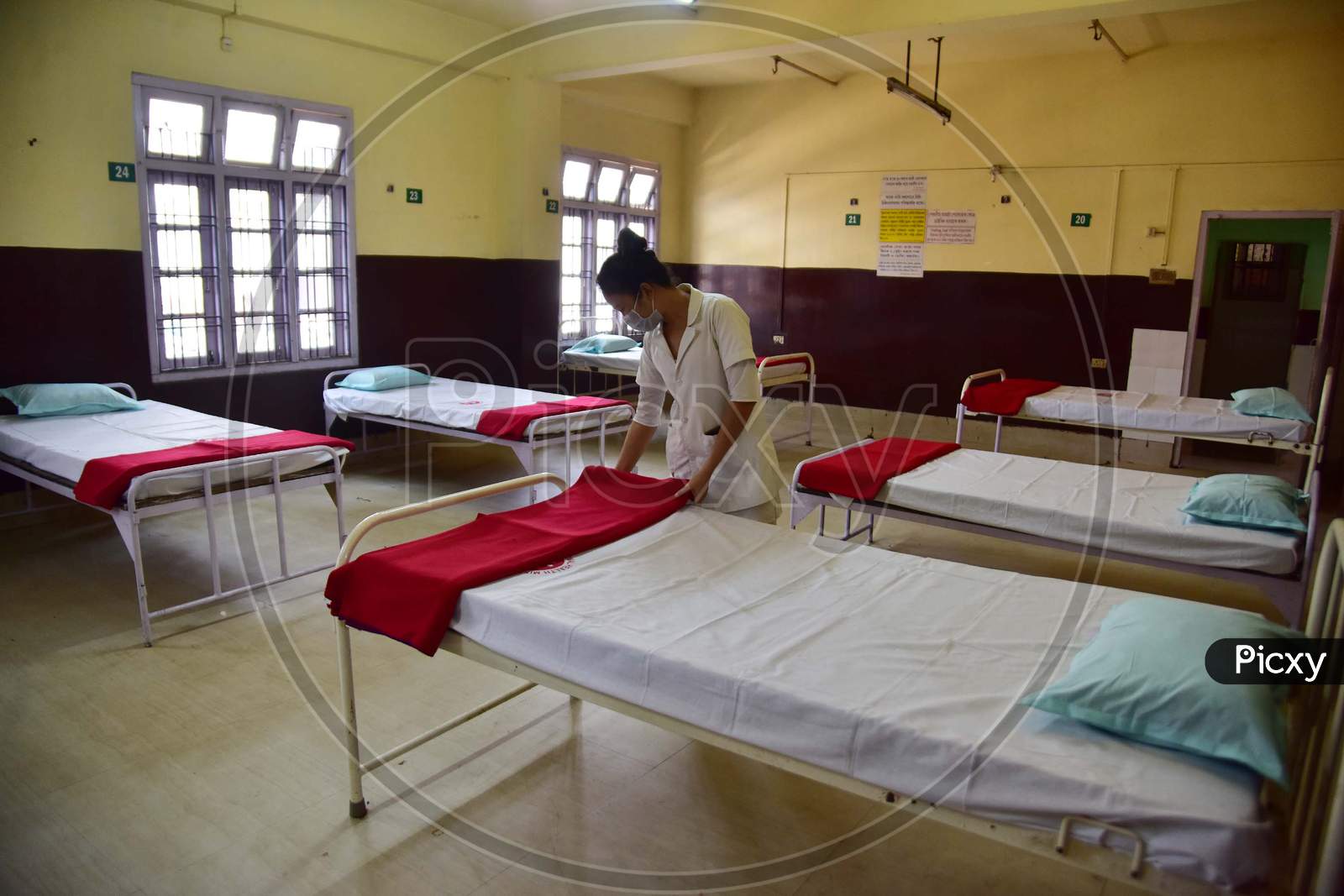 A Nures Arranges Beds  Of A Isolation Ward  At Civil Hospital  During A Government-Imposed Nationwide Lockdown As A Preventive Measure Against The Covid-19 Coronavirus In Nagaon District Of Assam On March 30,2020.