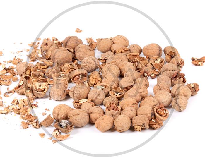 Bunch Of Walnuts Whole And Cracked. Isolated On A White Background.