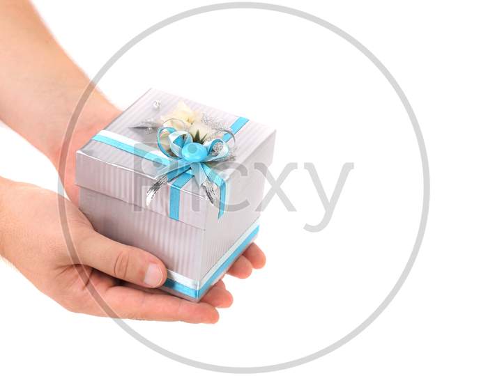 Stylish Gift Box With Blue Ribbon In Hand. Isolated On A White Background.