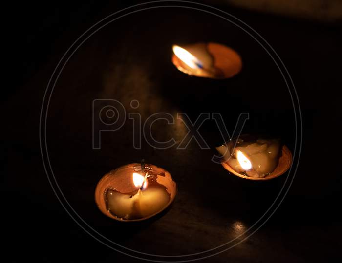 Earthen lamps and candles lit on 5th April to end the "darkness" of COVID-19 corona virus