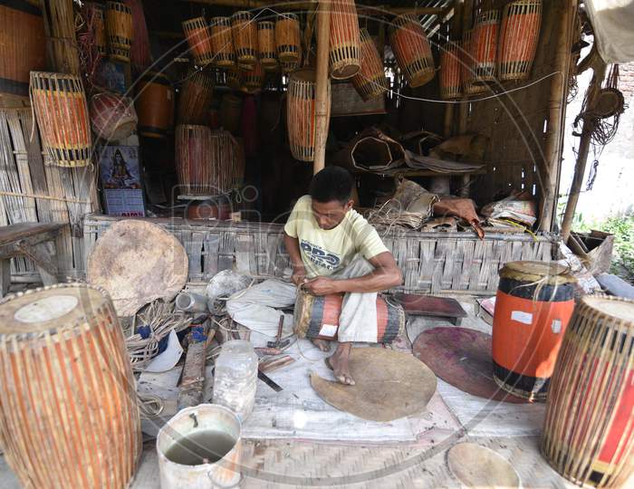 Artist making 'Dhol' - traditional Assamese drum ahead of Rongali Bihu festival at Barapujia village in the Morigaon